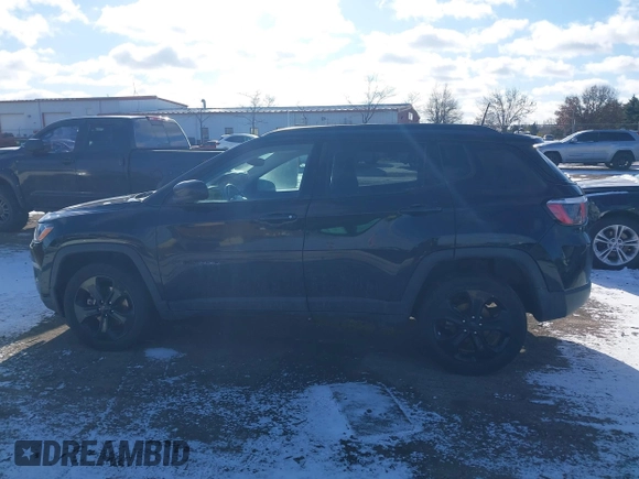 2019 Jeep Compass Latitude with VIN 3C4NJDBB9KT794074, listed as a IAAI auction lot 41068687 with 106,947 mi miles and . Bid and sale history available at DreamBid. Image 14.