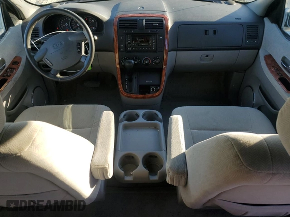2004 Kia Sedona LX with VIN KNDUP131346508490, listed as a Copart auction lot 77391594 with 41,211 mi miles and Salvage Title. Bid and sale history available at carsss.com. Image 8.