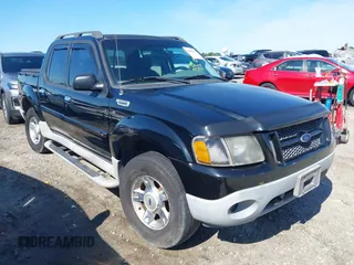 2003 Ford Explorer Sport Trac XLS z VIN 1FMZU77E23UB74361, wystawiony jako IAAI lot #42305659 z przebiegiem 193 291 mil mil oraz . Historia ofert i sprzedaży dostępna na DreamBid. Obrazek 1.