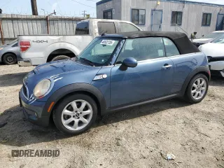 2010 MINI Convertible S with VIN WMWMS3C5XATY51076, listed as a Copart auction lot 48532735 with 104,901 mi miles and Clean Title. Bid and sale history available at DreamBid. Image 1.