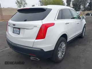 2019 Cadillac XT5 Luxury FWD with VIN 1GYKNCRS2KZ158560, listed as a IAAI auction lot 42067397 with 48,816 mi miles and . Bid and sale history available at DreamBid. Image 4.