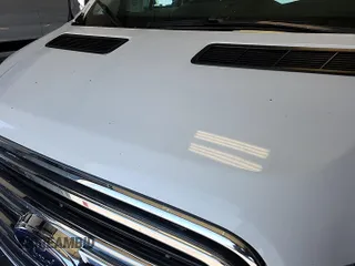 2019 Ford Transit with VIN 1FTYE1YM5KKA80355, listed as a IAAI auction lot 42159030 with 96,044 mi miles. Bid and sale history available at carsss.com. Image 1.