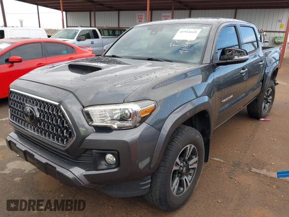 2018 Toyota Tacoma SR5 with VIN 3TMAZ5CN0JM061233, listed as a IAAI auction lot 41944668 with 94,314 mi miles and . Bid and sale history available at DreamBid. Image 17.