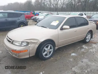 1998 Nissan Maxima GXE with VIN JN1CA21D6WM923286, listed as a IAAI auction lot 41555099 with 134,005 mi miles and . Bid and sale history available at DreamBid. Image 17.