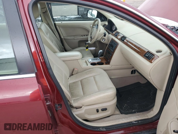 2005 Ford Five Hundred Limited with VIN 1FAFP28155G117589, listed as a Copart auction lot 80336804 with 104,198 mi miles and Salvage Title. Bid and sale history available at carsss.com. Image 7.