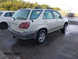 1999 Lexus RX 300 with VIN JT6GF10U3X0042492, listed as a IAAI auction lot 41940649 with 279,987 mi miles and . Bid and sale history available at DreamBid. Image 4.