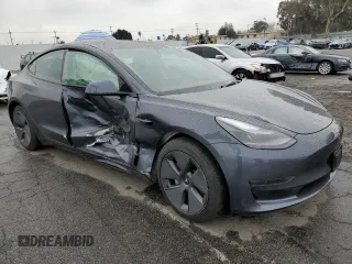2023 Tesla Model 3 with VIN 5YJ3E1EA2PF708297, listed as a Copart auction lot 47982675 with 16,246 mi miles and Salvage title. Bid and sale history available at DreamBid. Image 4.