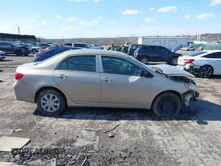 2009 Toyota Corolla with VIN 2T1BU40E19C102300, listed as a IAAI auction lot 41881241 with 154,765 mi miles. Bid and sale history available at carsss.com. Image 14.