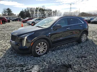 2019 Cadillac XT4 FWD Luxury with VIN 1GYAZAR48KF144489, listed as a Copart auction lot 43236595 with 57,601 mi miles and Salvage Title. Bid and sale history available at carsss.com. Image 1.
