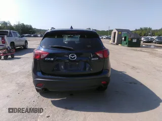 2014 Mazda CX-5 Touring z VIN JM3KE2CYXE0429149, wystawiony jako IAAI lot #42471772 z przebiegiem 222 440 mil mil oraz . Historia ofert i sprzedaży dostępna na DreamBid. Obrazek 16.