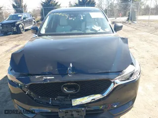 2019 Mazda CX-5 Grand Touring with VIN JM3KFBDM2K0603297, listed as a IAAI auction lot 41668241 with 54,583 mi miles. Bid and sale history available at carsss.com. Image 12.
