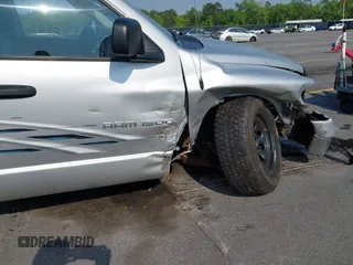 2003 Dodge 1500 ST z VIN 1D7HU18D93S346244, wystawiony jako IAAI lot #41998278 z przebiegiem 158 345 mil mil oraz . Historia ofert i sprzedaży dostępna na DreamBid. Obrazek 13.