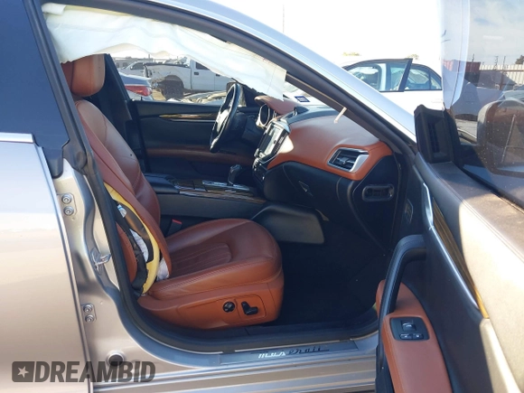 2015 Maserati Ghibli z VIN ZAM57XSA7F1135961, wystawiony jako IAAI lot #40831583 z przebiegiem 89 671 mil mil oraz . Historia ofert i sprzedaży dostępna na DreamBid. Obrazek 5.