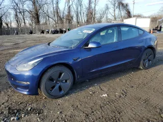 2023 Tesla Model 3 with VIN 5YJ3E1EA1PF395999, listed as a Copart auction lot 42262435 with 34,942 mi miles and Non Repairable. Bid and sale history available at DreamBid. Image 1.
