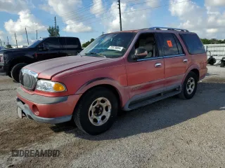 1999 Lincoln Navigator z VIN 5LMRU27A2XLJ41370, wystawiony jako Copart lot #72879004 z przebiegiem Nie podano mil oraz Szkoda całkowita • Salvage title. Historia ofert i sprzedaży dostępna na DreamBid. Obrazek 1.