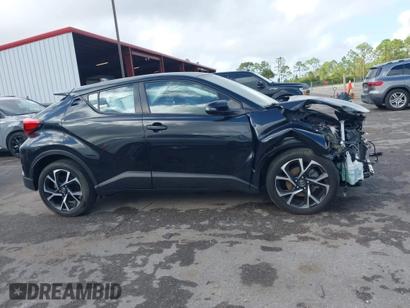 2019 Toyota C-HR XLE with VIN NMTKHMBX2KR100540, listed as a IAAI auction lot 41124095 with 38,073 mi miles and . Bid and sale history available at DreamBid. Image 14.