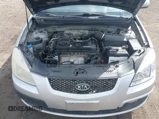2009 Kia Rio LX with VIN KNADE223796521410, listed as a IAAI auction lot 41887883 with 82,360 mi miles and . Bid and sale history available at DreamBid. Image 10.