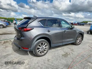 2019 Mazda CX-5 Grand Touring with VIN JM3KFADM2K1637664, listed as a Copart auction lot 63400975 with 45,663 mi miles and Salvage title. Bid and sale history available at DreamBid. Image 3.