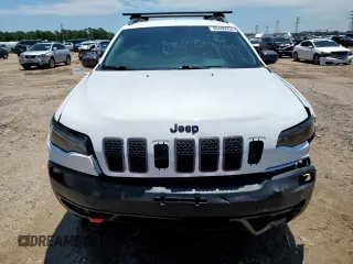 2020 Jeep Cherokee Trailhawk с VIN 1C4PJMBX4LD609103, выставлен на аукционе Copart как лот 60469955 с пробегом 70 179 миль миль и Списание • Salvage title. История ставок и продаж доступна на DreamBid. Изображение 5.