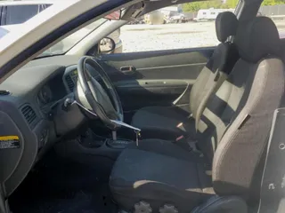 2008 Hyundai Accent SE z VIN KMHCN36C48U056976, wystawiony jako Copart lot #54720645 z przebiegiem 203 148 mil mil oraz Szkoda całkowita • Salvage title. Historia ofert i sprzedaży dostępna na DreamBid. Obrazek 7.