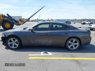 2014 Dodge Charger SE with VIN 2C3CDXBG0EH216023, listed as a IAAI auction lot 41827307 with 243,107 mi miles. Bid and sale history available at carsss.com. Image 14.