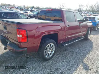2015 GMC Sierra 1500 Denali with VIN 3GTU2WEC6FG187427, listed as a IAAI auction lot 41874355 with 166,913 mi miles and . Bid and sale history available at DreamBid. Image 4.