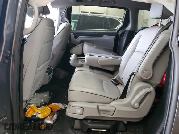 2023 Honda Odyssey Elite with VIN 5FNRL6H98PB056770, listed as a Copart auction lot 56984055 with Not provided miles and Salvage title. Bid and sale history available at DreamBid. Image 11.