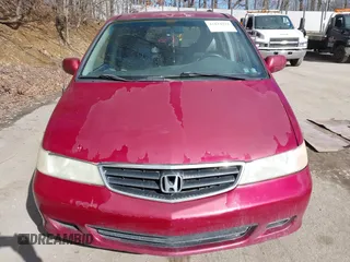 2003 Honda Odyssey EX-L with VIN 5FNRL18923B130410, listed as a IAAI auction lot 41814211 with 209,335 mi miles and . Bid and sale history available at DreamBid. Image 12.