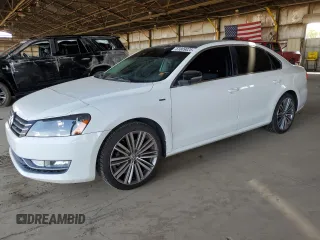 2014 Volkswagen Passat SE with VIN 1VWBT7A3XEC119405, listed as a Copart auction lot 61809025 with 101,903 mi miles and Salvage title. Bid and sale history available at DreamBid. Image 1.