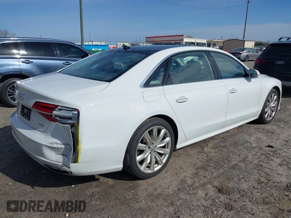 2017 Audi A8 L with VIN WAU44AFD0HN012571, listed as a IAAI auction lot 41717676 with 120,832 mi miles. Bid and sale history available at carsss.com. Image 4.