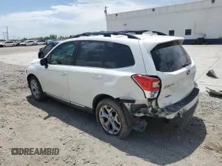 2018 Subaru Forester Touring with VIN JF2SJAWC4JH435749, listed as a Copart auction lot 63526465 with 143,029 mi miles and Salvage title. Bid and sale history available at DreamBid. Image 2.
