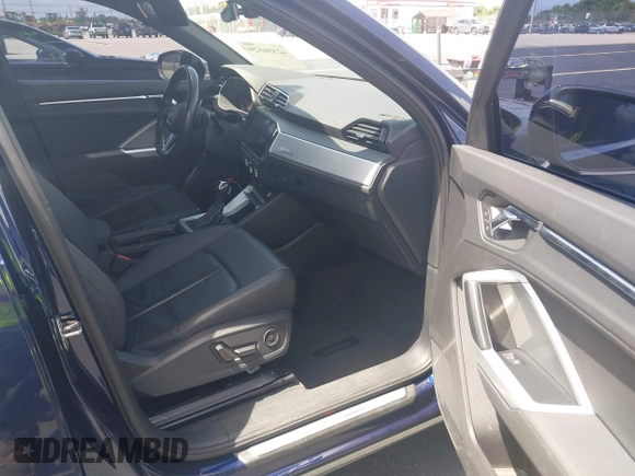 2021 Audi Q3 S line Premium with VIN WA1DECF37M1032508, listed as a IAAI auction lot 42556529 with 55,125 mi miles and . Bid and sale history available at DreamBid. Image 5.