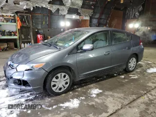 2012 Honda Insight z VIN JHMZE2H37CS006243, wystawiony jako Copart lot #87506845 z przebiegiem 131 485 mil mil oraz Szkoda całkowita • Salvage title. Historia ofert i sprzedaży dostępna na DreamBid. Obrazek 1.