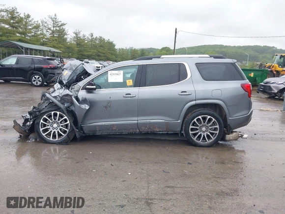2021 GMC Acadia Denali z VIN 1GKKNXLS1MZ160927, wystawiony jako IAAI lot #42335027 z przebiegiem 60 014 mil mil oraz . Historia ofert i sprzedaży dostępna na DreamBid. Obrazek 13.