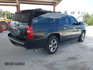 2011 Chevrolet Suburban LTZ with VIN 1GNSKKE3XBR180241, listed as a IAAI auction lot 42365771 with 231,477 mi miles and . Bid and sale history available at DreamBid. Image 4.