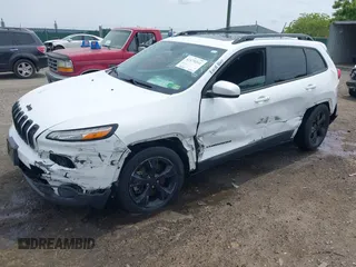 2016 Jeep Cherokee Altitude with VIN 1C4PJMCB3GW121211, listed as a IAAI auction lot 42470241 with 168,343 mi miles and . Bid and sale history available at DreamBid. Image 2.