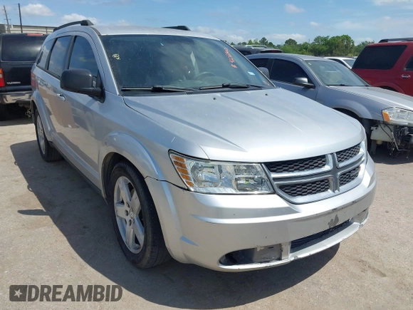 2014 Dodge Journey SE with VIN 3C4PDCAB0ET284437, listed as a IAAI auction lot 42063601 with 206,913 mi miles and . Bid and sale history available at carsss.com. Image 1.