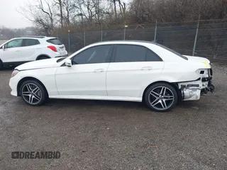 2014 Mercedes-Benz E 550 Sport with VIN WDDHF9BBXEA940995, listed as a IAAI auction lot 41872452 with 50,451 mi miles and . Bid and sale history available at DreamBid. Image 15.