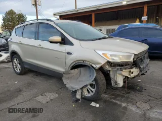 2018 Ford Escape SE z VIN 1FMCU9GD7JUA34635, wystawiony jako Copart lot #48379395 z przebiegiem 123 832 mil mil oraz Szkoda całkowita • Salvage title. Historia ofert i sprzedaży dostępna na DreamBid. Obrazek 4.