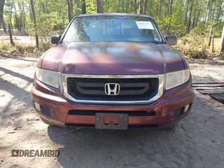 2009 Honda Ridgeline RT z VIN 5FPYK162X9B102195, wystawiony jako IAAI lot #42023098 z przebiegiem 212 413 mil mil oraz . Historia ofert i sprzedaży dostępna na DreamBid. Obrazek 12.