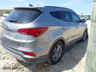 2018 Hyundai Santa Fe Sport 2.4L with VIN 5XYZU3LB8JG563903, listed as a IAAI auction lot 41814986 with 56,287 mi miles. Bid and sale history available at carsss.com. Image 4.