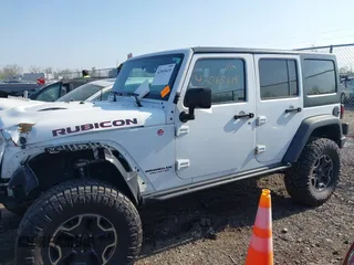2015 Jeep Wrangler Unlimited Rubicon with VIN 1C4BJWFG1FL602412, listed as a IAAI auction lot 42065619 with 109,070 mi miles. Bid and sale history available at carsss.com. Image 14.