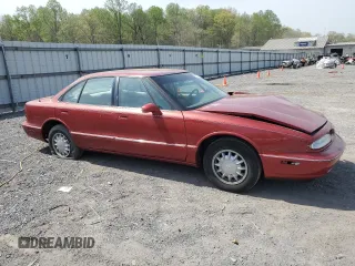 1998 Oldsmobile 88 LS z VIN 1G3HN52K2W4809677, wystawiony jako Copart lot #54331535 z przebiegiem 99 587 mil mil oraz Szkody całkowita. Historia ofert i sprzedaży dostępna na DreamBid. Obrazek 4.