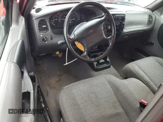 1999 Ford Ranger XLT with VIN 1FTYR14X4XPA57227, listed as a Copart auction lot 80829684 with 166,834 mi miles and Salvage Title. Bid and sale history available at DreamBid. Image 8.