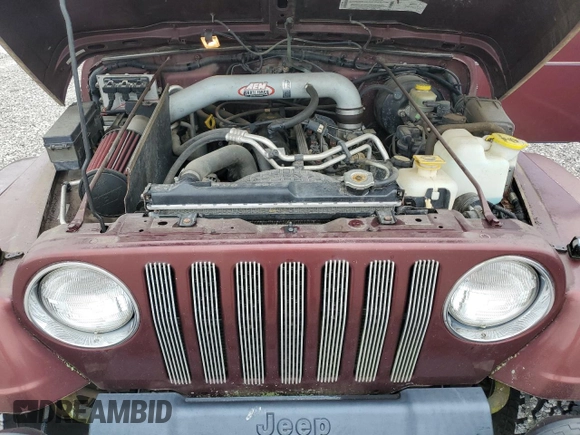 2001 Jeep Wrangler Sahara z VIN 1J4FA59SX1P305100, wystawiony jako Copart lot #58606685 z przebiegiem 76 856 mil mil oraz Czysty tytuł • Clean title. Historia ofert i sprzedaży dostępna na DreamBid. Obrazek 11.