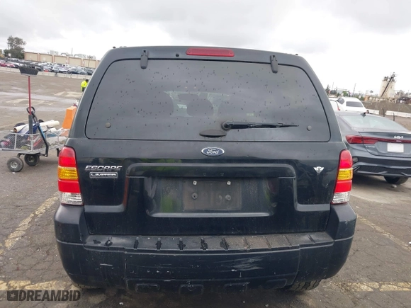 2005 Ford Escape Limited with VIN 1FMYU04155KC05430, listed as a IAAI auction lot 41784958 with 190,822 mi miles. Bid and sale history available at carsss.com. Image 16.