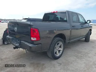 2014 Ram 1500 Express with VIN 1C6RR6KT2ES301959, listed as a IAAI auction lot 41619440 with 146,163 mi miles. Bid and sale history available at carsss.com. Image 4.