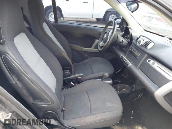 2013 Smart fortwo Pure with VIN WMEEJ3BA6DK664115, listed as a IAAI auction lot 42412198 with 64,522 mi miles and . Bid and sale history available at DreamBid. Image 5.