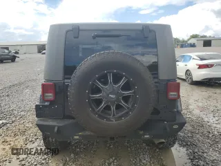 2007 Jeep Wrangler Sahara z VIN 1J8FA54137L209032, wystawiony jako Copart lot #56502475 z przebiegiem 129 402 mil mil oraz Szkoda całkowita • Salvage title. Historia ofert i sprzedaży dostępna na DreamBid. Obrazek 6.