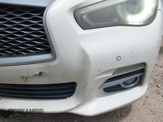 2014 Infiniti Q50 Hybrid Sport with VIN JN1AV7AP7EM690553, listed as a IAAI auction lot 42196341 with 221,709 mi miles and . Bid and sale history available at DreamBid. Image 6.